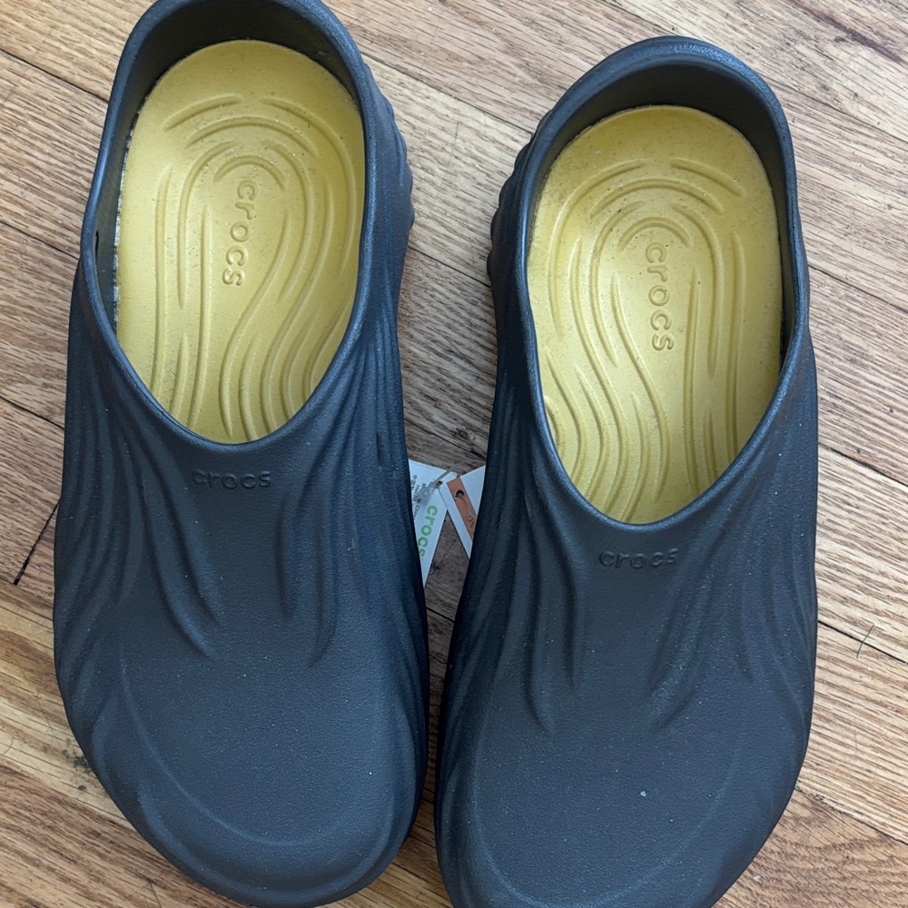 CROCS Black Slip-On Clogs with Yellow Insole